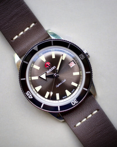 Rado steel watch on metalic dial and leather band