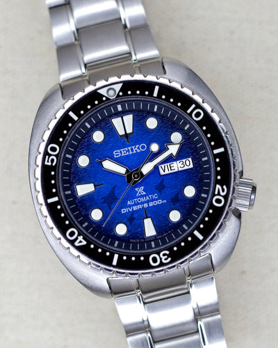 Seiko steel watch with blue ocean dial