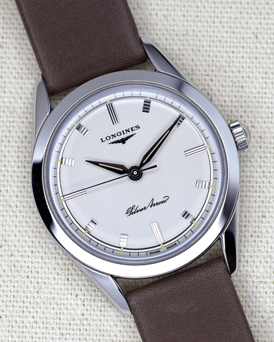 Longines steel watch with silver dial and brown strap 