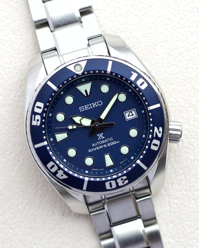 Seiko Steel watch on blue dial and bracelet 