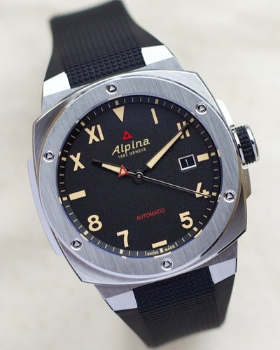 Alpina steel watch on black dial