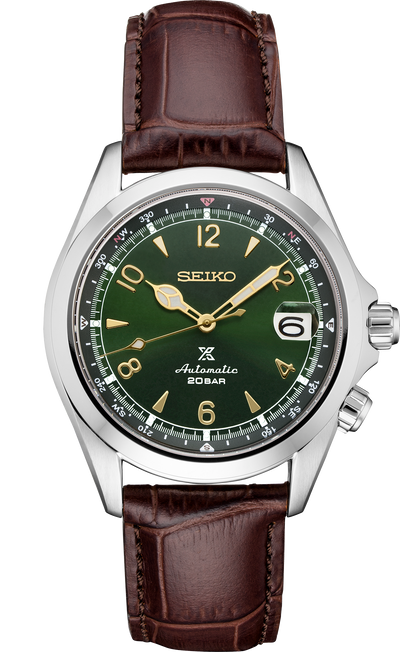 Seiko steel watch on green dial and leather band