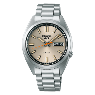 Seiko steel watch on ivory dial with day date window