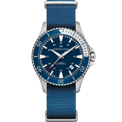 steel wrist watch with blue dial and blue nylon band