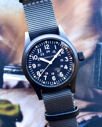 black Hamilton watch on nylon strap