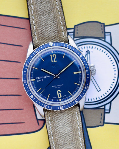 CW Steel watch with blue dial and canvas strap