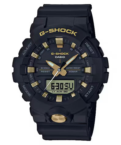 Gshock watch black rubber band black case and gold accent dial