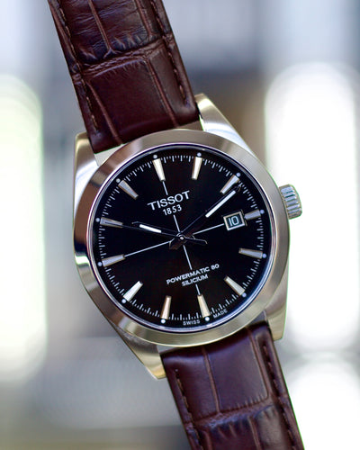 Tissot steel watch with crosshair dial