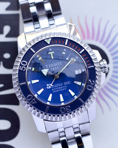 Tissot diver watch in steel and blue dial