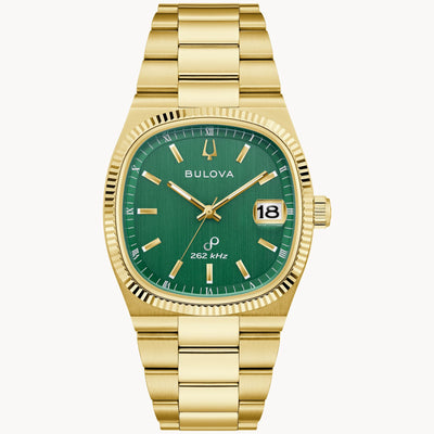 Bulova gold tone watch with green face 