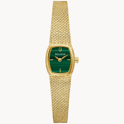 Gold watch with green face on a white background