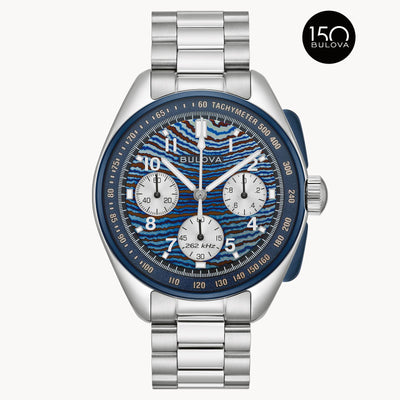 Bulova watch with blue face and silver band on a white background