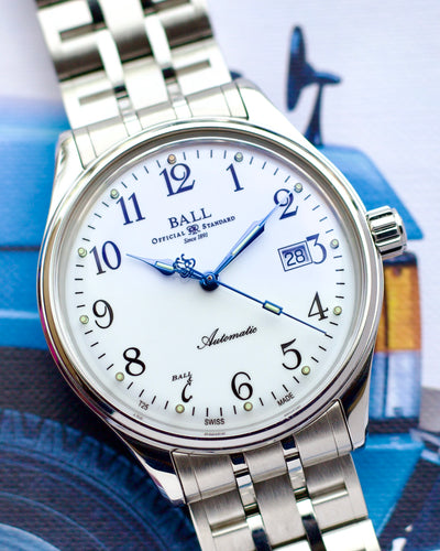 Silver Ball watch with a white face on a blue background