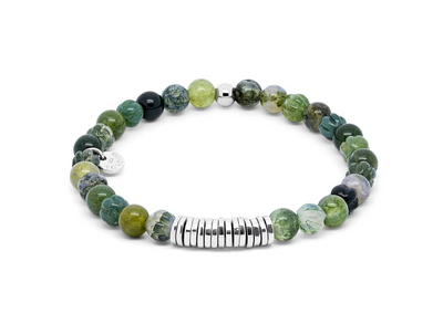 Beaded bracelet with green and brown stones and a silver bar on a white background