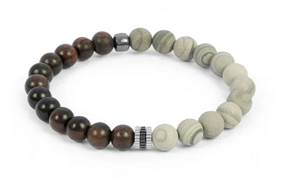 Bracelet with wooden and stone beads on a white background