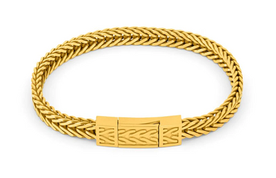 Gold braided bracelet with a clasp on a white background