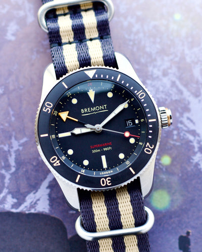 Bremont steel watch on strap