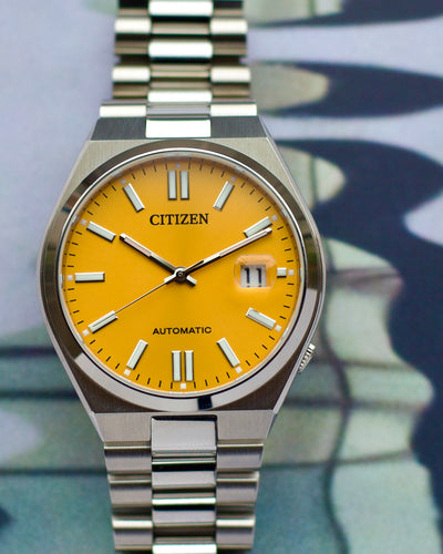 Citizen steel watch with striking yellow dial