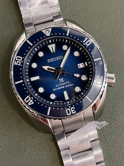 Seiko steel watch with blue dial