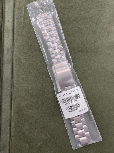 Hamilton titanium bracelet in plastic package