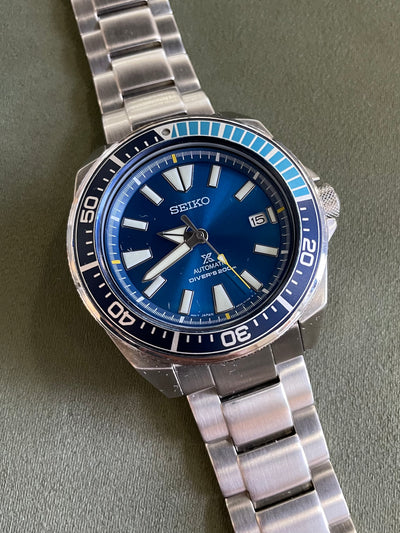 Seiko watch on steel and blue dial