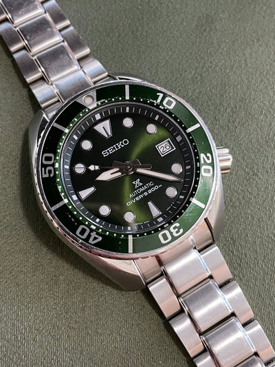 Seiko Steel watch on green dial and Bezel