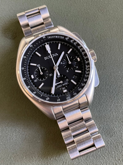 Bulova steel watch with black dial