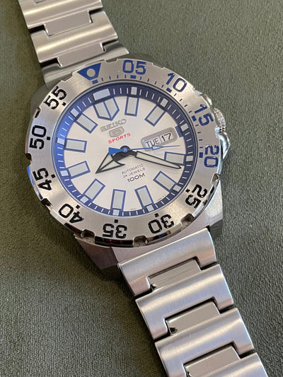 Seiko steel watch on silver and blue dial