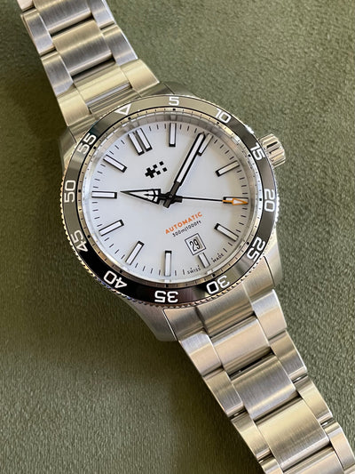 Christopher Ward steel watch with white dial