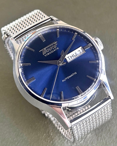 Tissot watch in steel on blue dial
