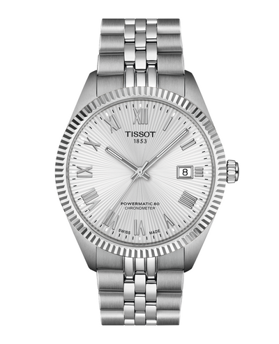 Silver Tissot watch with detailed face on a white background