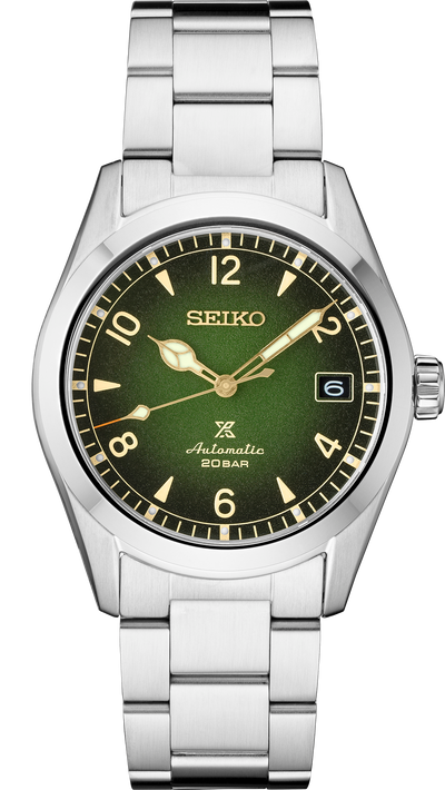 Seiko steel watch on green dial and steel bracelet
