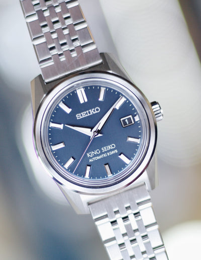 Seiko Steel watch on blue dial and steel bracelet