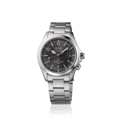 Silver Seiko watch with black dial on a white background