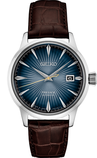 steel wristwatch on blue dial and brown leather strap