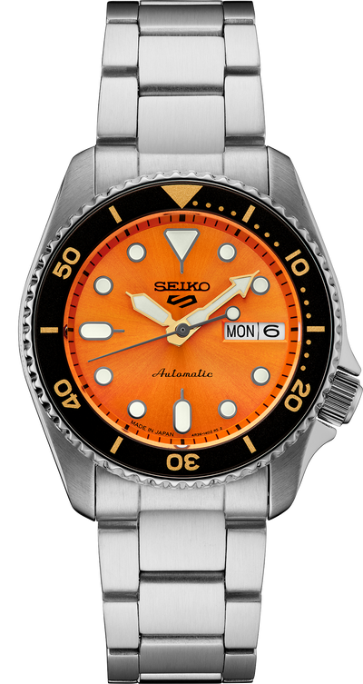 steel wristwatch on orange dial and steel bracelet