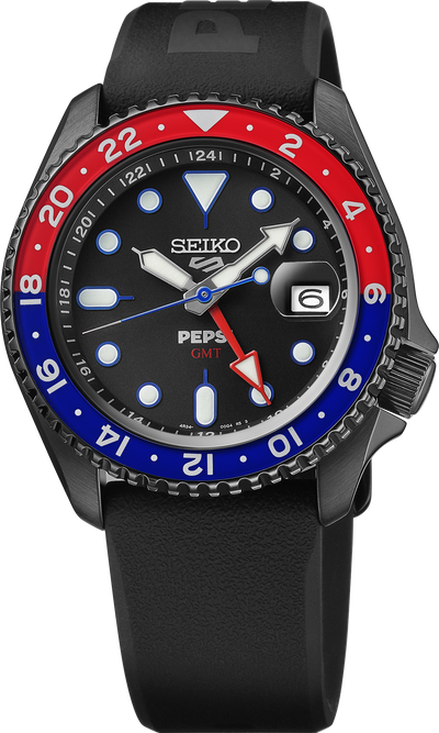 Seiko Pepsi watch with black strap, red and blue bezel on a white background