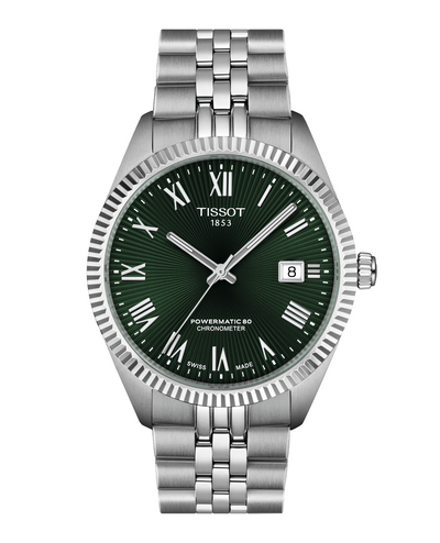 Tissot watch with green dial and silver bracelet on a white background