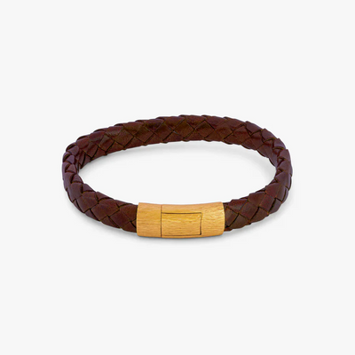 Brown braided leather bracelet with a gold clasp on a white background