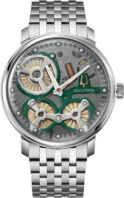 Steel wristwatch with green revealing dial showing mouvemnt on steel bracelet