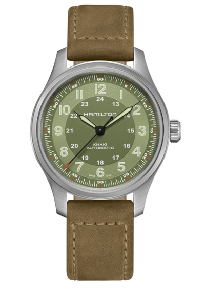 titanium wristwatch on green dial and brown leather band