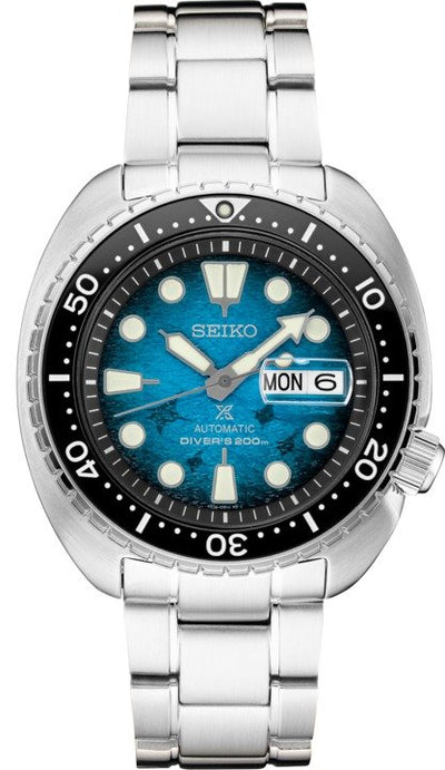 steel wristwatch on blue dial and steel bracelet 