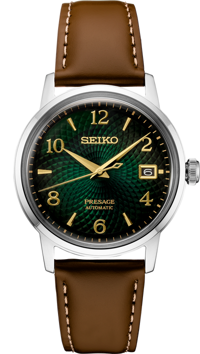 steel wrist watch on green dial and brown leather band