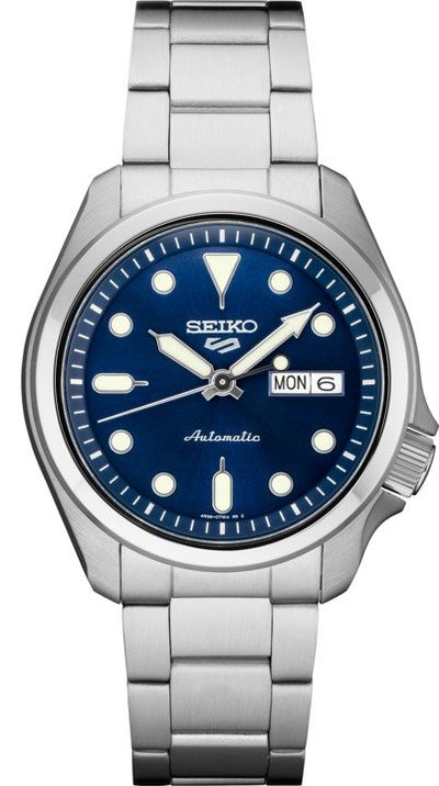 steel wrist watch on blue dial and steel bracelet