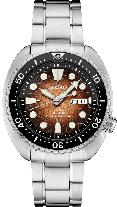 steel wristwatch on brown dial and steel bracelet