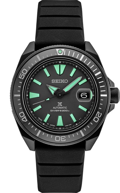 Black steel watch with black dial and green lume on black starp