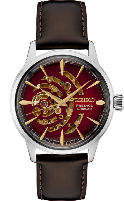 steel wristwatch on red open dial and brown leather band