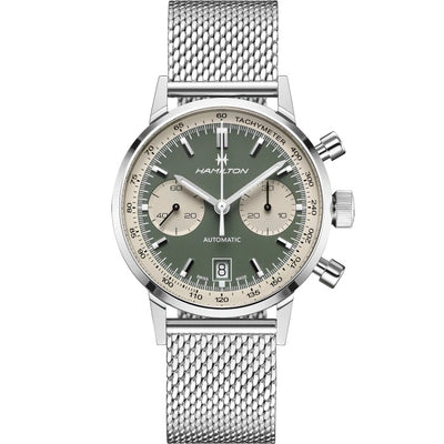 steel wristwatch on green dial and steel mesh bracelet