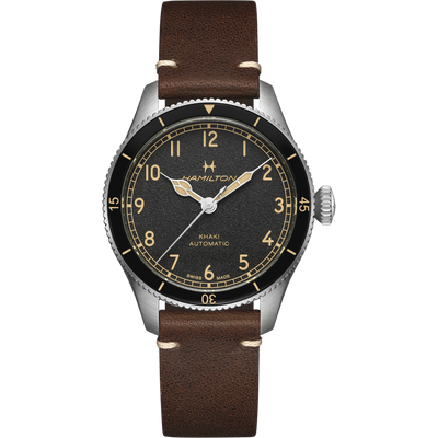 steel wristwatch with black dial and brown leather band