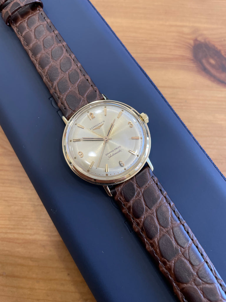 1960 s Longines Grand Prize 14k gold